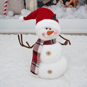 Snowman figure with hat and scarf